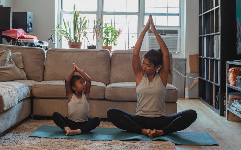A parent and a child practicing yoga together, showing a family bonding activity.
